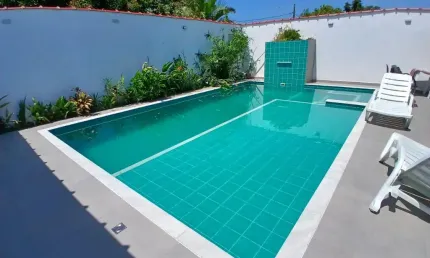Casa com piscina, 3 quartos e área gourmet em Itanhaém.