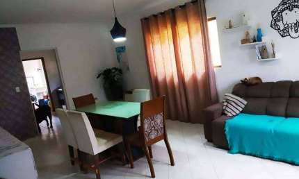 Casa sobreposta, de 93m², com 2 quartos, bairro Macuco - Santos/SP