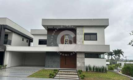 Sobrado com 3 dormitórios à venda, 325 m² por R$ 2.500.000,00 - Condomínio Terras