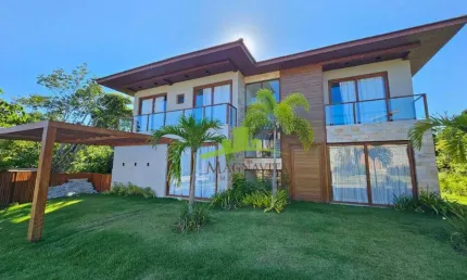 Casa à venda em Praia do Forte: 6 suítes, piscina, área gourmet, porteira fechada, 472m², Condomínio Praia Bella. Agende sua visita!