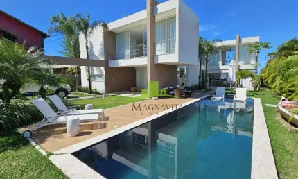 Casa à venda em Busca Vida, Buscaville, 4 suítes, 480m², piscina, área gourmet, 6 vagas. Condomínio com lazer completo.