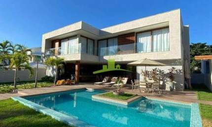 Casa à venda no Condomínio Paraíso, Guarajuba, 303m², 7 suítes, piscina, área gourmet, a 20m da praia, Porteira Fechada. Agende sua visita!