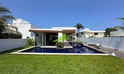 Casa de luxo à venda em Interlagos, Litoral Norte: 5 suítes, 750m², piscina, área gourmet, arquitetura moderna de David Bastos, segurança 24h