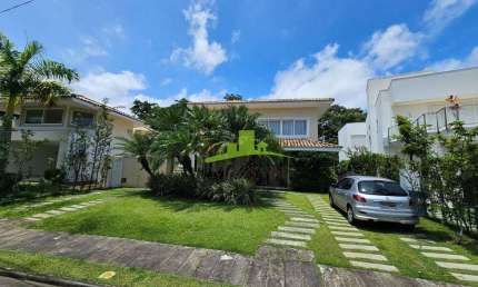 Casa no Alphaville Salvador 1, 520m², 4 suítes, piscina, deck com hidromassagem, área verde, R$ 3.600.000,00