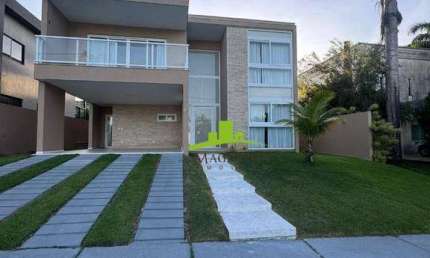 Alphaville Litoral Norte 1. Casa à venda com 290m², 4 suítes, Piscina privativa, Nascente total, Espaço gourmet, acabamento premium. Alto Padrão.