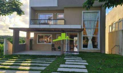 Alphaville Litoral Norte 2. Casa Alto Padrão à venda com 330m², 4 suítes, Piscina, Espaço gourmet, Vista área verde. Lazer completo. Pronta para morar