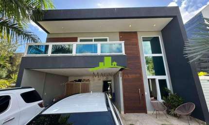 Alphaville II. Casa Alto Padrão à venda, 668m², 5 suítes, Piscina com borda infinita, Academia privativa, Área gourmet, 7 vagas de garagem, Segurança