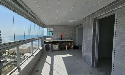 Apartamento frente mar 2 suítes, sacada envidraçada e lazer completo - caiçara