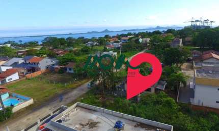 Terreno em Itapoá, 300 metros do mar, pouca vegetação e cercado
