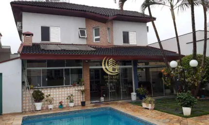 Sobrado com 4 dormitórios à venda, 370 m² por R$ 2.300.000,00 - Condomínio Village Taubaté - Taubaté/SP