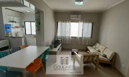 Apartamento padrão com 2 dormitórios á menos de 100 metros na praia do Tombo-Guarujá/SP.