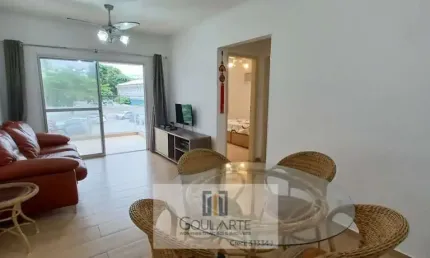 Apartamento padrão com acesso a sacada, 2 dormitórios, lado praia - enseada-guarujá/sp.