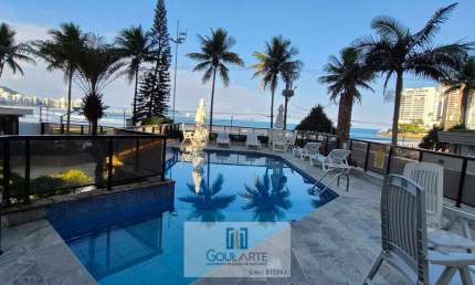 Apartamento com sacada gourmet e vista lateral mar, 4 dormitórios sendo 2 suítes, condomínio frente mar na praia da  ASTÚRIAS-Guarujá/SP.