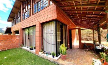 Casa de campo aconchegante em Condomínio à venda em Piracaia-SP
