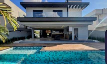 Casa de alto padrão em Alphaville Dom Pedro - Campinas-SP: 5 quartos, 5 suítes, 3 salas, 7 banheiros, 4 vagas, 440m² de área.