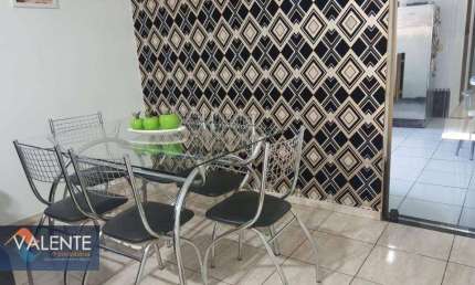 Village com 3 dormitórios à venda, 127 m² por R$ 424.000,00 - Vila Melo - São Vicente/SP