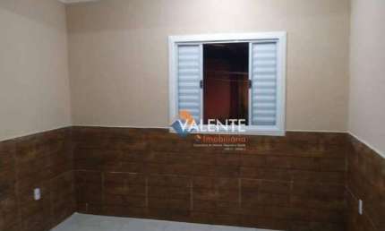 Casa com 2 dormitórios à venda, 64 m² por R$ 320.000,00 - Japuí - São Vicente/SP