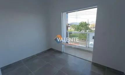 Casa com 2 dormitórios à venda, 61 m² por R$ 320.000,00 - Caiçara - Praia Grande/SP