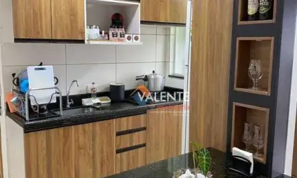 Apartamento com 2 dormitórios à venda, 55 m² por R$ 370.000,00 - Caiçara - Praia Grande/SP