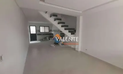 Sobrado com 3 dormitórios à venda, 108 m² por R$ 670.000,00 - Caiçara - Praia Grande/SP