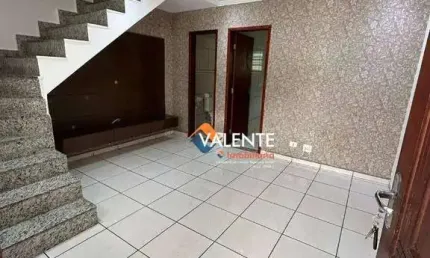 Sobrado com 2 dormitórios à venda, 70 m² por R$ 325.000,00 - Vila Voturuá - São Vicente/SP