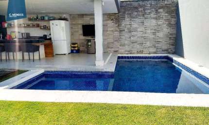Casa com 3 dormitórios à venda, 150 m² por R$ 1.090.000,00 - Guaribas - Eusébio/CE