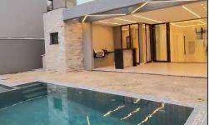 Casa com 3 dormitórios à venda, 175 m² por R$ 1.350.000,00 - Cidade Alpha - Eusébio/CE