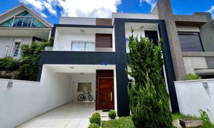 Casa em condomínio fechado com 3 quartos à venda na Rua Abóbora, 76, Uberaba, Curitiba por R$ 1.065.000
