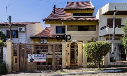 Casa com 4 quartos à venda na Avenida Pereira Pinto, 215, Jardim São Pedro, Porto Alegre por R$ 1.295.000