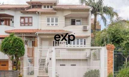 Casa com 3 quartos à venda na Rua Professor Isidoro La Porta, 112, Jardim Itu Sabará, Porto Alegre por R$ 1.240.100