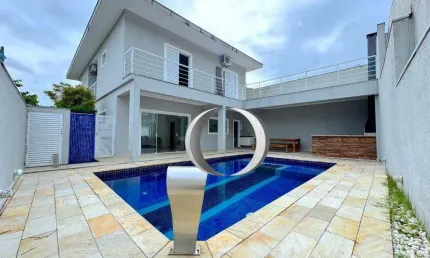 Casa em condomínio com piscina, espaço gourmet, 4 suítes à venda, 300 m² por R$ 1.600.000 - Jardim Albamar - Guarujá/SP