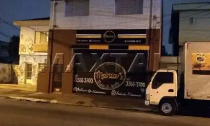 Prédio residencial e comercial com 283m² composto por 2 apartamentos e uma loja no  jardim brasil
