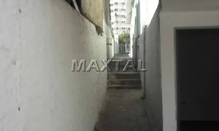 Terreno em Santa Terezinha com 228m², possui 3 casas com 127m² de área construída