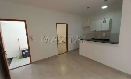 Apartamento em Santana com 36m², 1 dormitório, sala, cozinha, banheiro com box e área de serviço.