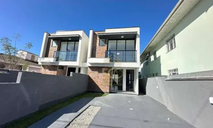 Sobrado com 3 dormitórios sendo uma suíte e duas demi-suíte à venda, 112 m² por R$ 690.000 - Areias - São José/SC