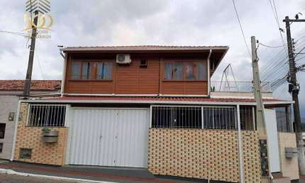 Casa com 5 dormitórios à venda, 240 m² por R$ 1.200.000,00 - Forquilhas - São José/SC