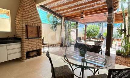 Casa em condomínio fechado com 3 quartos à venda na Estrada Municipal PLN-360, 920, Terras do Cancioneiro, Paulínia, 184 m2 por R$ 1.337.000
