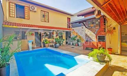 CASA à venda com piscina e 2 quartos em Peruíbe, no bairro Centro
