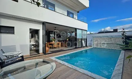 CASA à venda com piscina e 4 quartos em Peruíbe, no bairro Residencial Flora Rica