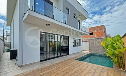CASA à venda com piscina e 3 quartos em Peruíbe, no bairro Residencial Flora Rica