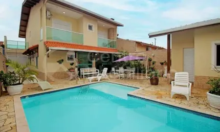 CASA à venda com piscina e 4 quartos em Peruíbe, no bairro Maria H Novaes