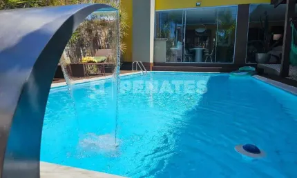 399m² em capim macio – 4 suítes, piscina, varanda gourmet e anexo versátil
