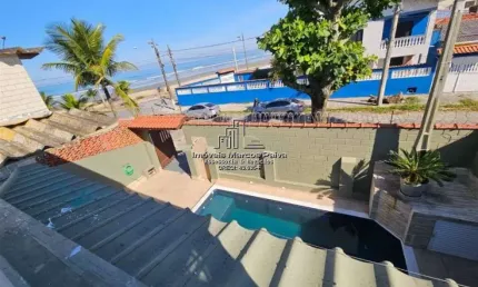 Casa beira-mar com 4 dormitórios + piscina + salão de jogos.