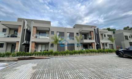 Village com 2 dormitórios à venda, 69 m² por R$ 1.400.000,00 - Riviera Módulo 22 - Bertioga/SP
