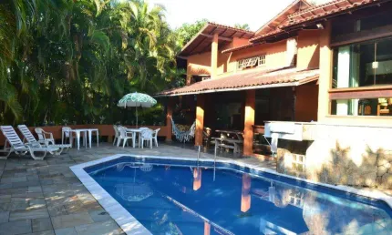 Casa com 5 dormitórios para alugar, 430 m² por R$ 4.400,00/dia - Riviera - Módulo 26 - Bertioga/SP