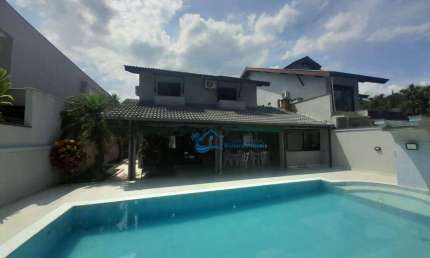Casa com 5 dormitórios à venda, 290 m² por R$ 10.000.000,00 - Riviera Módulo 5 - Bertioga/SP