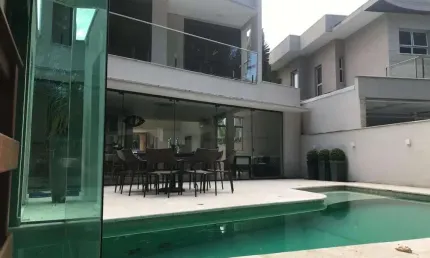 Casa com 5 dormitórios à venda, 419 m² por R$ 10.000.000,00 - Riviera Módulo 21 - Bertioga/SP