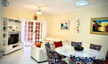 Village com 2 dormitórios, 111 m² - venda por R$ 1.250.000,00 ou aluguel por R$ 7.457,00/mês - Riviera - Módulo 30 - Bertioga/SP