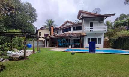 Casa com 5 dormitórios para alugar por R$ 7.000,00/dia - Guaratuba II - Bertioga/SP
