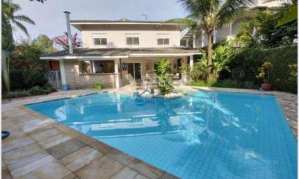 Casa com 5 dormitórios à venda por R$ 6.900.000,00 - Riviera Módulo 03 - Bertioga/SP